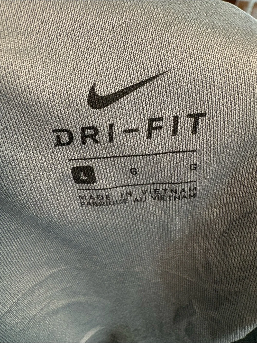 Nike Women’s Light Gray Athletic Shorts with Swoosh